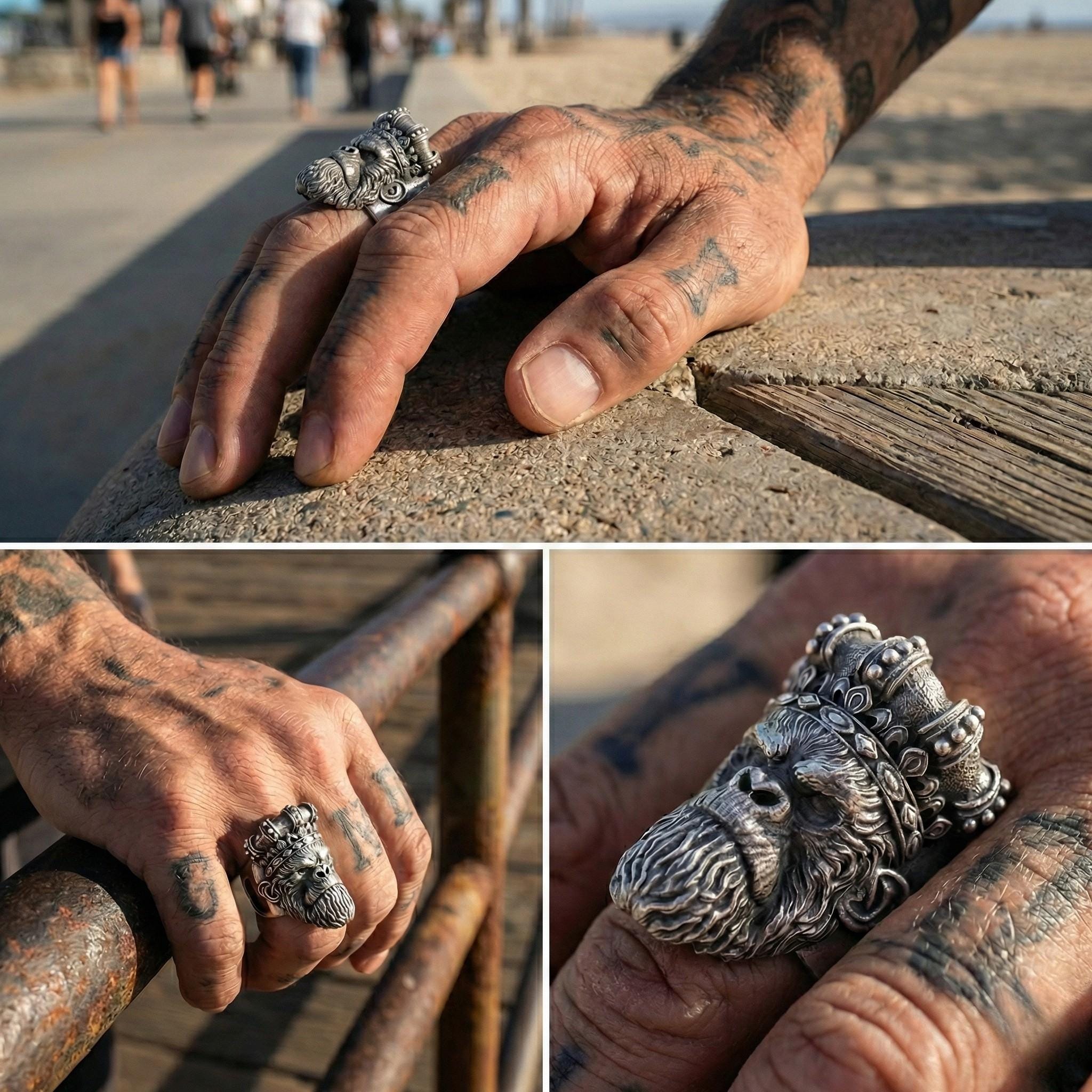 A person's hand wearing a silver metal ring with a crown-like design, and another hand with a similar ring.